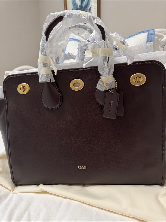 Coach Handbags - Coach maple BUY NOW turnlock tote size 40
Prestige and pristine condition!
